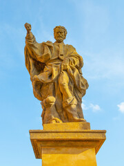 Sandstone statue from the 15th century with St. Rochu, Prague Europe.. St. Rochu was very popular, intercessions were addressed to him for the healing of the sick during plague epidemics.