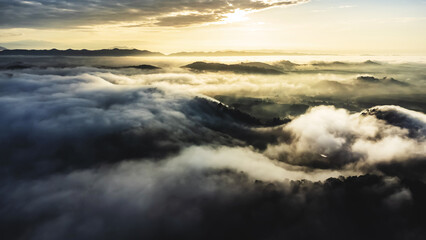 Aerial view of landscape Sunrise above clouds dramatic light