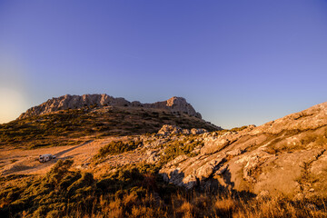 mountainside with campervans