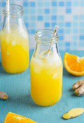 Tropical fruity drink with pineapple and orange