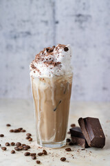 Fresh cold coffee with milk and whipped cream