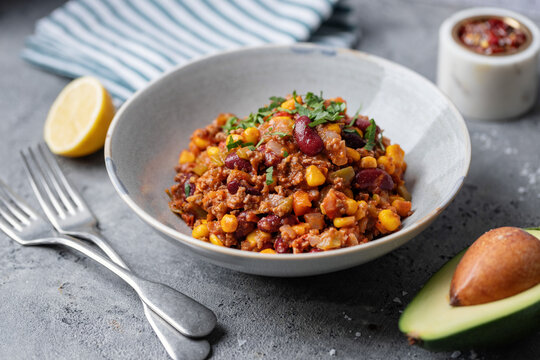 Chili con carne served in bowl