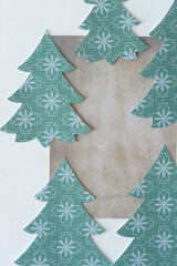 Fototapeta na wymiar paper with holiday trees