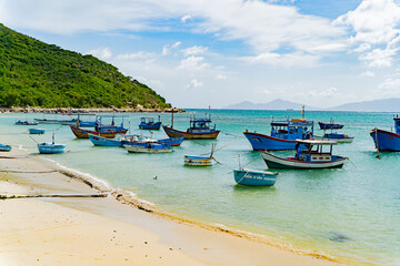 Fototapeta na wymiar Fishing village. Boats at sea. Sunny weather. Doclet Vietnam.