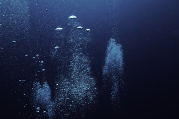 Fototapeta na wymiar bubbles under water diving background