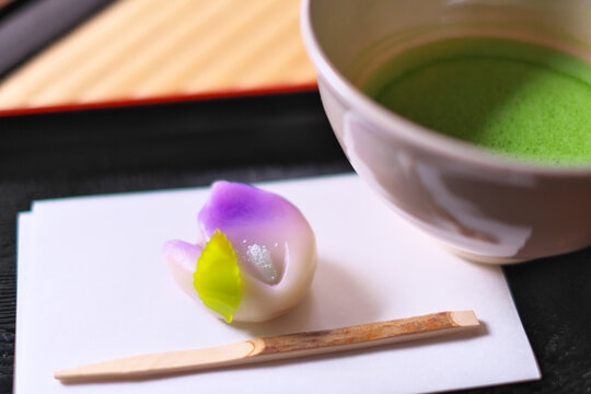 Japanese traditional sweets and green tea on the tray
