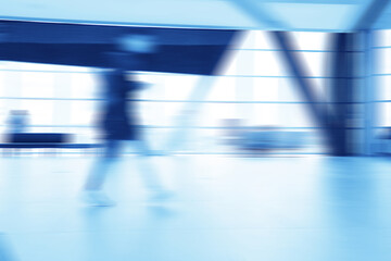blurry abstract business background blue movement people concept inside