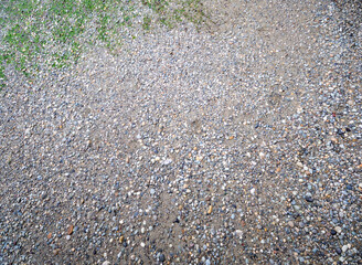 Gray small rocks ground texture.