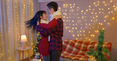 couple dance together on xmas