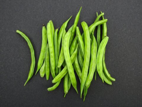 Fresh Guar Or Cluster Bean On Black Background 