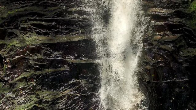Slow motion shot of a waterfall from above