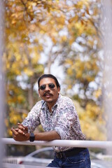Fototapeta premium man modeling in fall season