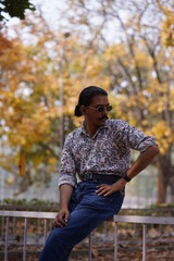 man wearing glasses in fall season