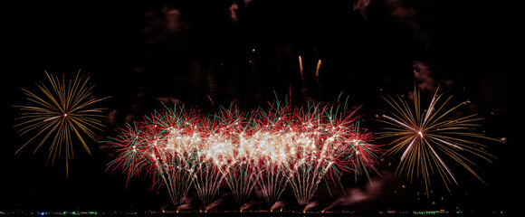 Firework display on isolated black background at Pattaya City. 