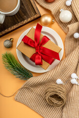 Obraz na płótnie Canvas Christmas decorations, gifts and christmas ball on yellow background. christmas concept.