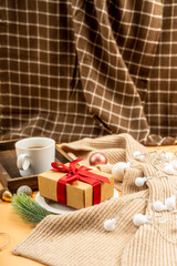 Christmas decorations, gifts and coffee on yellow background. christmas concept.