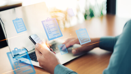 Businessmen look on smartphones watching social platforms and marketing online to plan the best promotions and super sell and discount price products, Social media, and digital online concepts.