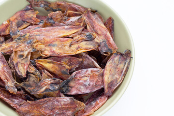 Dried squid in green bowl
