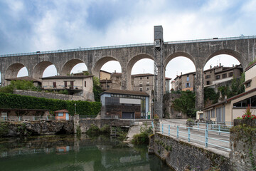 Old stone aqueduct in the town of Saint Nazaire en Royans