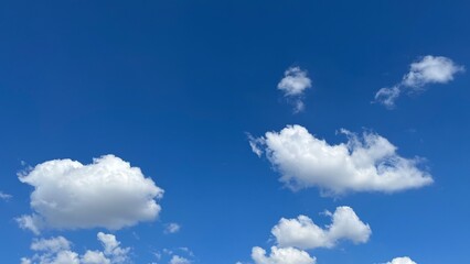 Naklejka na ściany i meble blue sky with clouds in a sunny day 