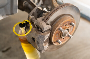 Automatic change of brake fluid in a car service. 