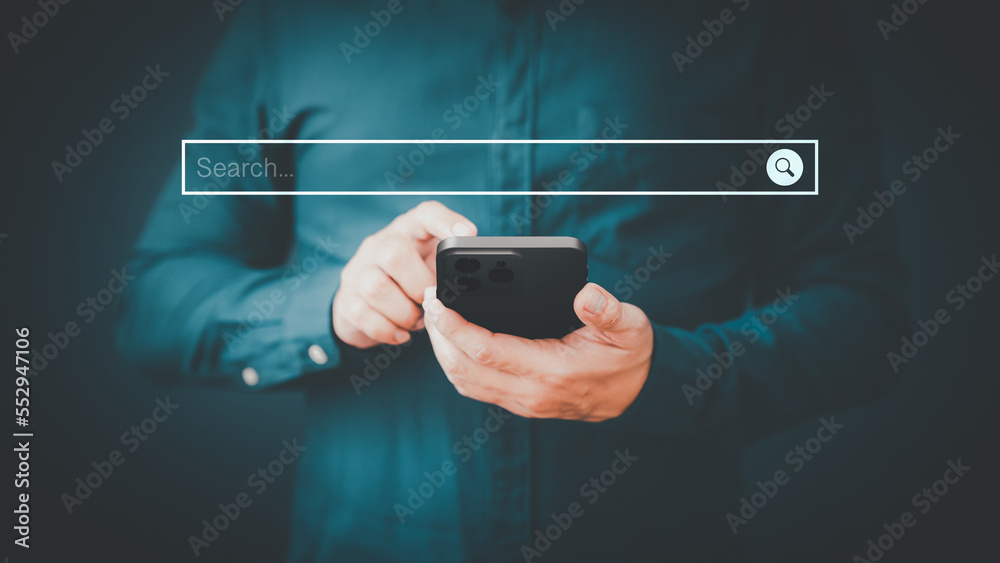 Poster Man using a mobile phone in the room for searching browsing internet data information. Business concept for smartphone using search with your website.