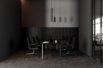 Grey office interior with workplace and laptop, business hall and window