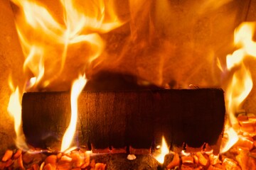 fire in fireplace with wood