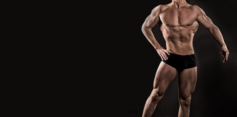 Fototapeta na wymiar athlete bodybuilder on advertisement, copy space. studio shot of muscular athlete. bodybuilding pose