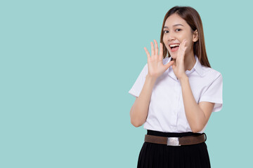 Teen student girl of Asian ethnicity in university uniform open mouths raising hands screaming...