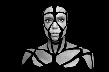 Portrait of a young woman with bold grey glowing makeup posing in the studio. Shape of gray polygons on female face. Pieces of face isolated on black background.