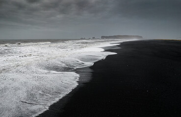 Black beach and strong waves in Iceland