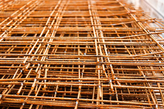 Rebar, reinforcing bars or steel close up, reinforcement steel, wires mesh of steel used as a tension device in reinforced concrete.
