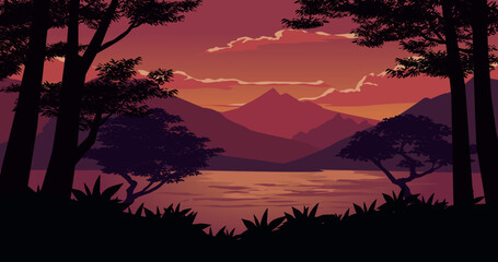 sunset over the mountains with lake