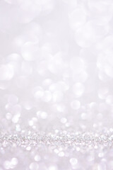 Light glitter vertical background. Christmas wallpaper phone light bokeh sparkle and winter background. Shiny small glitter texture. Copy space. luxury holiday backdrop mockup for display of product