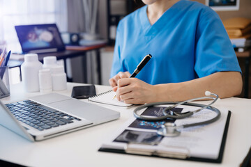 Medical technology concept. Doctor working with mobile phone and stethoscope in office.