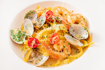 seafood pasta on the white plate