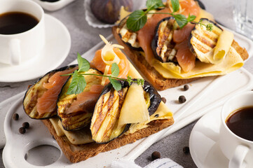 sandwich with red fish, grilled zucchini, healthy breakfast