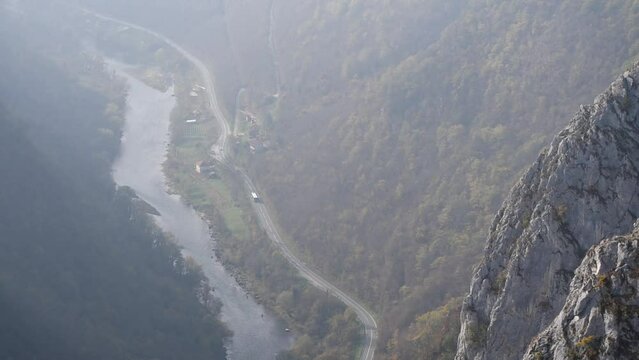 Aerial view of river Vrbas and road near Banja Luka in morning haze