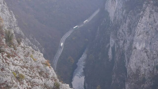 Aerial view of river Vrbas and road near Banja Luka in morning haze