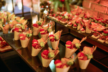 The buffet at the reception. Assortment of well decorated gourmet food . Banquet service. catering and holidays concept