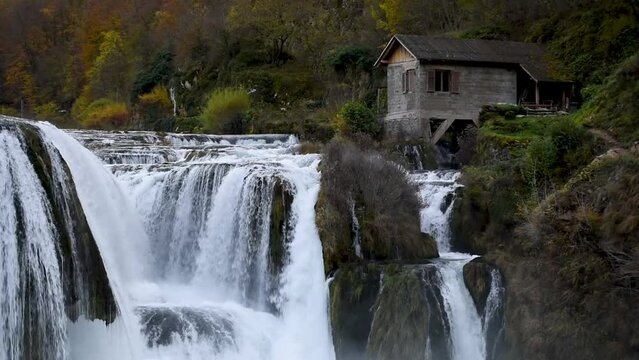 Water mill on riverbank of Una river near Strbacki buk or waterfall in National Park Una