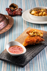 Patty with seafood and sauce