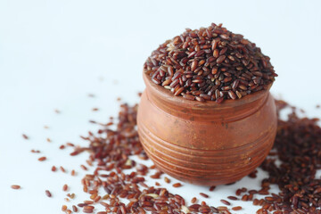 red rice in a bowl on table , haradighi rice 