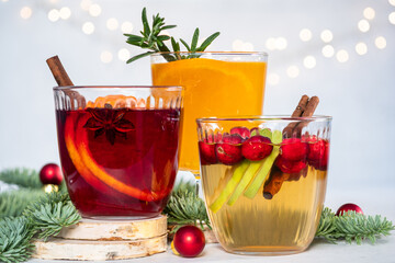 Sangria or Mulled wine with Apple, cranberry and orange for Christmas table