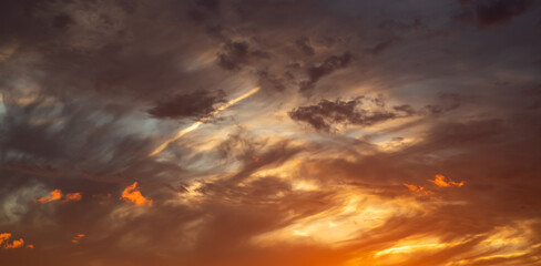 Naklejka na ściany i meble Beautiful dramatic sky at sunset, nature background