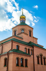 Christian church cross in high steeple tower for prayer