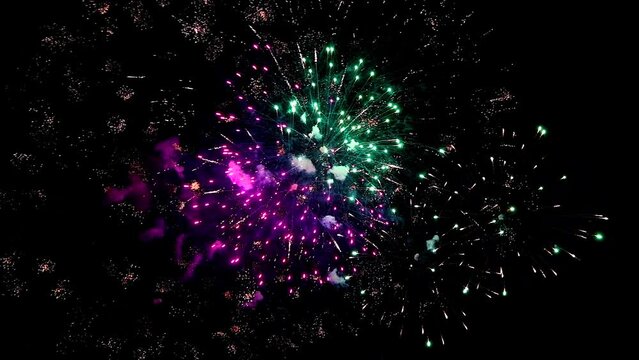 Real Fireworks close up on Deep Black Background Sky on Fireworks festival before new year party 2023 , Independence day and Christmas eve concept. High quality 4k video