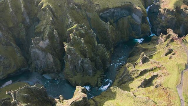 A green canyon with a blue river. Fjadrargljufur canyon in Iceland #1.