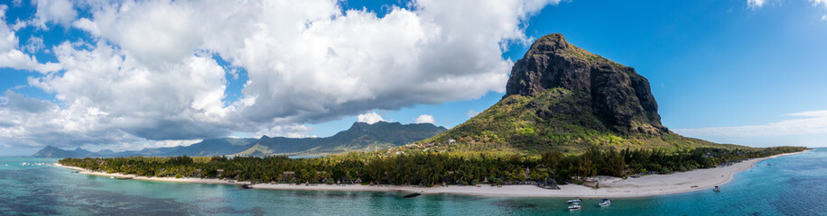 Panoramic aerial view of Mauritius island with famous Le Morne Brabant mountain, beautiful beach,...